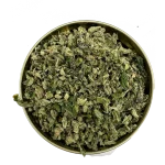 Top-down view of Banana Punch Shake cannabis blend packed into a tin