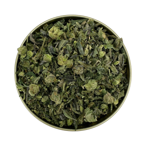 A lid filled with El Chapo Shake cannabis, showing a mix of buds and loose leaf shake