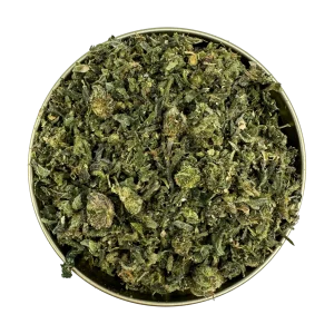 Rockstar Shake cannabis blend filled to the top of a round tin, finely ground