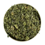 Top-down view of Rockstar Shake cannabis blend packed into a round tin