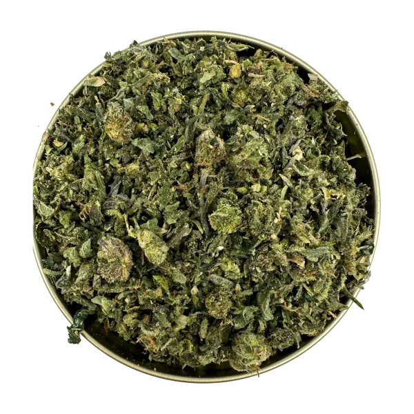 Top-down view of Rockstar Shake cannabis blend packed into a round tin