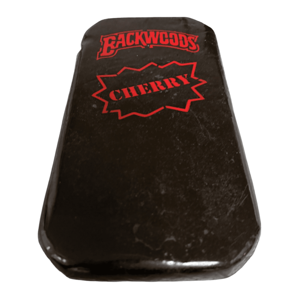 Rich, dark Backwoods Cherry Hash with a deep red undertone, highlighting its infused cherry essence.