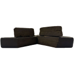 Soft, freshly cut blocks of Strawberry Kush Hash revealing a dense, dark interior